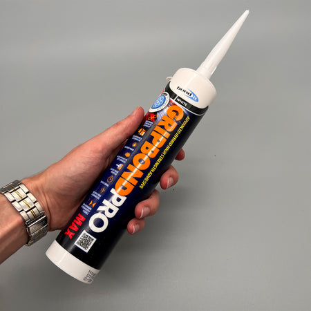 Bond It Gripbond Pro Max White adhesive tube held in hand – professional grab adhesive for trade use